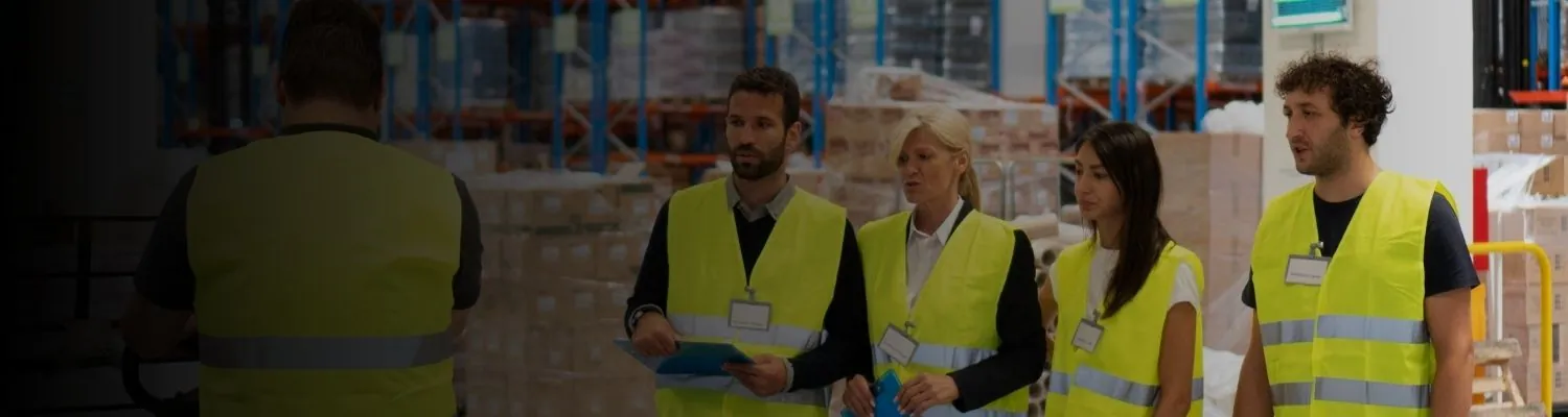 Streamline-It trainer leading a hands-on warehouse automation training session with operators