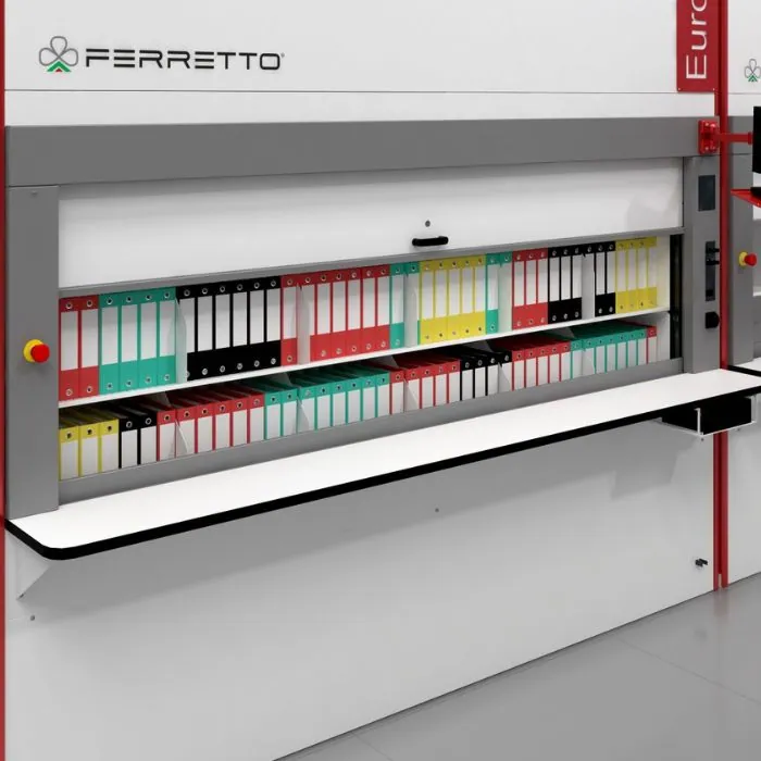 Eurot vertical carousel with rotating shelves presenting material to the operator in limited spaces